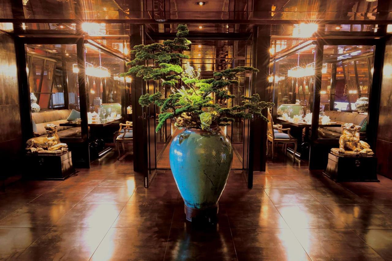 Palais De Chine Hotel Taipei Bagian luar foto The interior of the restaurant